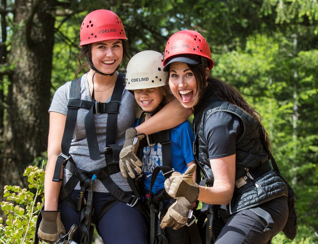 two ladies and a kid on a trek and zipling combo tour